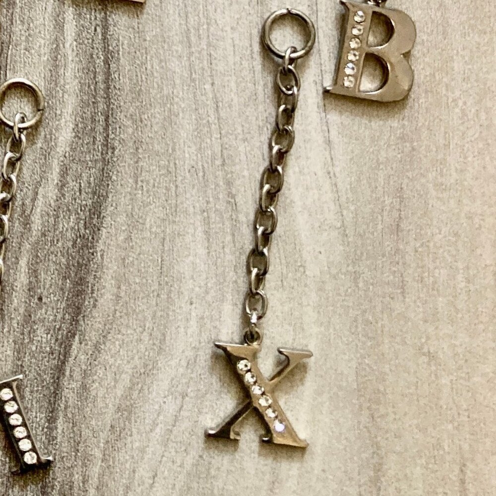 NWT Silver-colored (X), rhinestone studded initial Bag Charm
